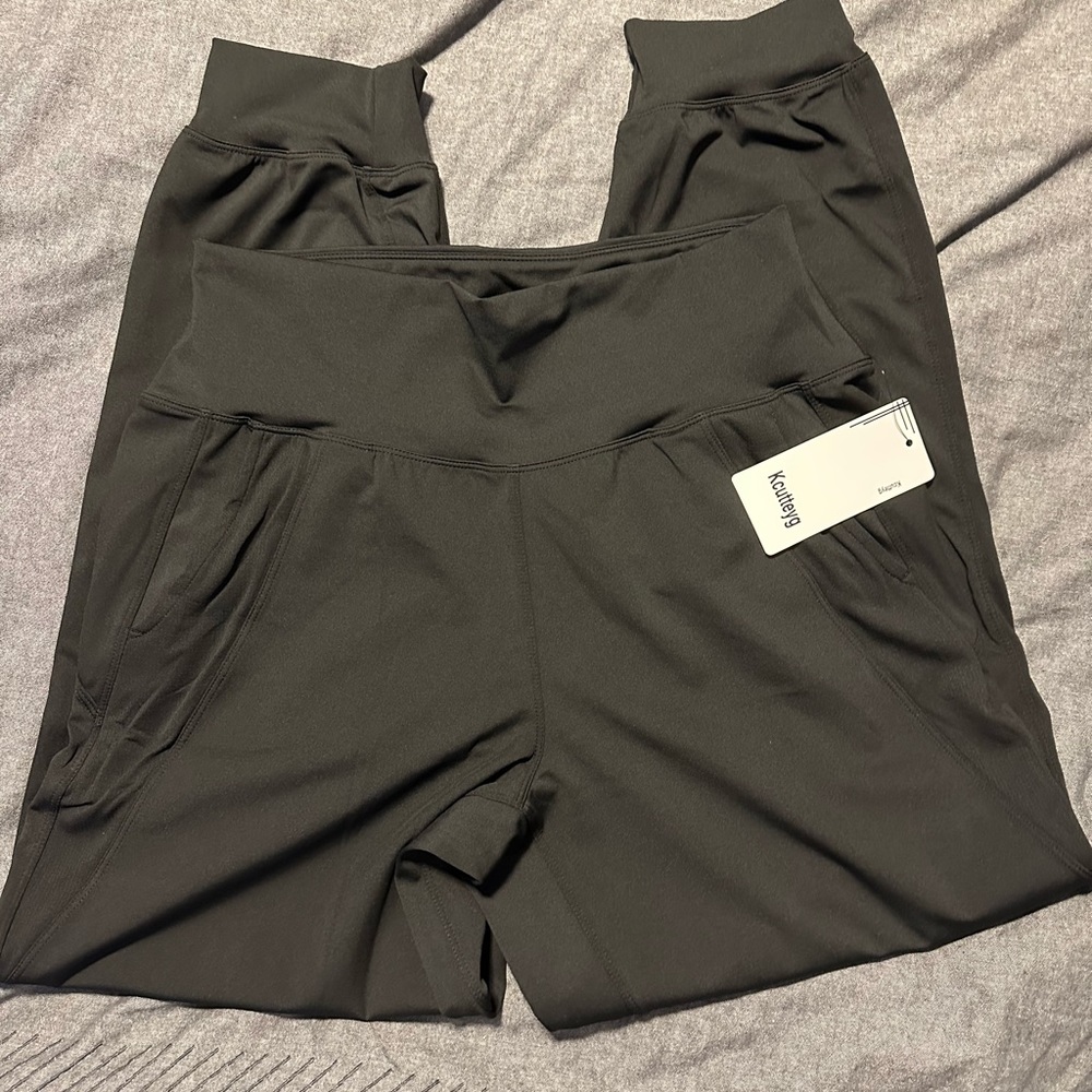Never worn black joggers